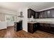 Well-equipped kitchen with hardwood floors, stainless steel appliances, and ample storage at 2875 Riverbend Ct, Snellville, GA 30078