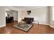 Inviting living room with hardwood floors and open access to the dining area at 2875 Riverbend Ct, Snellville, GA 30078