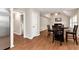 Open concept living room with hardwood floors and ample seating at 2875 Riverbend Ct, Snellville, GA 30078