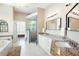 Primary bathroom features a soaking tub, tile shower, and granite countertops at 3053 Lawson Dr, Marietta, GA 30064