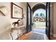 Inviting foyer features hardwood floors and an arched doorway, creating a warm welcome at 3053 Lawson Dr, Marietta, GA 30064
