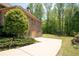 Attached two-car garage and driveway provide ample parking and backyard access at 3053 Lawson Dr, Marietta, GA 30064