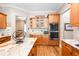 Modern kitchen with granite countertops, stainless steel appliances, hardwood floors, and ample cabinet space at 3053 Lawson Dr, Marietta, GA 30064