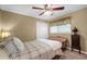 Cozy bedroom with natural light, ceiling fan, and a comfortable bed at 3139 Mary Dr, Marietta, GA 30066