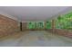 Spacious brick-enclosed carport area, offering protection and privacy at 3139 Mary Dr, Marietta, GA 30066