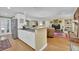 Open-concept kitchen with an eat-in bar flows into the cozy living area at 3139 Mary Dr, Marietta, GA 30066