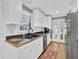Functional kitchen features white cabinetry, wood countertops, and stainless steel appliances at 3139 Mary Dr, Marietta, GA 30066