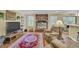 Inviting living room features a brick fireplace, built-in shelves, and hardwood floors at 3139 Mary Dr, Marietta, GA 30066