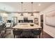 Stylish kitchen with stainless steel appliances, a large island, and modern lighting at 3699 School Street, Chamblee, GA 30341