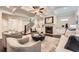 Inviting living room with a fireplace, comfortable seating, and hardwood floors at 3699 School Street, Chamblee, GA 30341