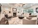 Bright living room featuring a coffered ceiling, fireplace, and neutral decor at 3699 School Street, Chamblee, GA 30341