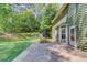 Charming backyard featuring a patio, picnic table, and play set at 3987 Ivory Gables Pl, Buford, GA 30519