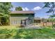 The backyard of this home includes a picnic table and fenced area at 3987 Ivory Gables Pl, Buford, GA 30519