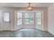 Bright dining area features a bay window that offers ample natural lighting and backyard views at 3987 Ivory Gables Pl, Buford, GA 30519