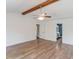 Spacious main bedroom boasting hardwood floors, a ceiling fan, and an ensuite bathroom at 3987 Ivory Gables Pl, Buford, GA 30519