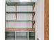 Pantry features custom-built shelves and storage perfect for staying organized at 3987 Ivory Gables Pl, Buford, GA 30519
