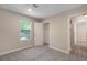 Bedroom with new carpeting, closet and natural light at 6891 Hickory Log Rd, Austell, GA 30168