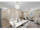 Open dining area with modern lighting and stylish decor, perfect for Gathering meals at 6891 Hickory Log Rd, Austell, GA 30168