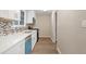 Lovely kitchen features white cabinets, modern countertops and stainless steel appliances at 6891 Hickory Log Rd, Austell, GA 30168