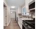 Well lit kitchen features stainless steel appliances and modern countertops at 6891 Hickory Log Rd, Austell, GA 30168