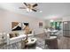 Bright living room featuring hardwood floors, modern decor, and an open concept layout at 6891 Hickory Log Rd, Austell, GA 30168