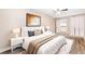 Nicely appointed bedroom has a ceiling fan, walk-in closet and calming neutral paint at 6891 Hickory Log Rd, Austell, GA 30168