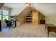 Versatile bonus room, ideal for an office, with natural light and a comfortable workspace at 2611 Fireside Sw Trl, Conyers, GA 30094