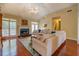 Spacious living room featuring a fireplace and hardwood floors at 2611 Fireside Sw Trl, Conyers, GA 30094