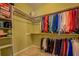 Spacious walk-in closet offering generous storage capacity with custom shelving and hanging space at 2611 Fireside Sw Trl, Conyers, GA 30094