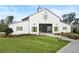Community shed with well-maintained landscaping and a grassy lawn in the front at 3003 Clayton St, Woodstock, GA 30188