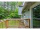 This cozy deck offers a private outdoor space overlooking lush green trees and offers a tranquil retreat at 3897 Mcgill Dr, Decatur, GA 30034