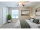 Staged main bedroom featuring decor, a window, and carpet flooring at 3897 Mcgill Dr, Decatur, GA 30034