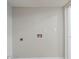 The laundry wall shows electrical outlets, hook-ups, and access to the outdoors at 3897 Mcgill Dr, Decatur, GA 30034