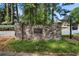 Stone entrance to Mountain Creek neighborhood with landscaped surroundings at 4628 Mountain Creek Ne Dr, Roswell, GA 30075