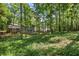 Two story home with brick and siding and backyard featuring a wooden deck perfect for outdoor enjoyment at 4628 Mountain Creek Ne Dr, Roswell, GA 30075