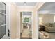 Inviting foyer leading to a dining area and living room. Neutral walls, hardwood floors at 4628 Mountain Creek Ne Dr, Roswell, GA 30075