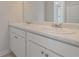 Close up on a bright double sink bathroom vanity with sleek chrome faucets at 494 Charleston Pl, Villa Rica, GA 30180