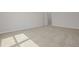Bright bedroom with neutral carpet and paint providing a serene space at 494 Charleston Pl, Villa Rica, GA 30180