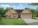 Charming single-story home boasts a stone facade and a well-manicured lawn at 494 Charleston Pl, Villa Rica, GA 30180