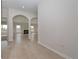 Bright foyer with hardwood floors and arched entryways leading to the living areas at 494 Charleston Pl, Villa Rica, GA 30180