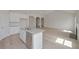 Open kitchen view showcases stainless steel dishwasher and granite countertops providing a cohesive look at 494 Charleston Pl, Villa Rica, GA 30180
