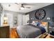 This bedroom features hardwood floors, an accent wall and plenty of closet space at 67 Lannon Ne Ave, Atlanta, GA 30317