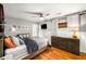 Bedroom with hardwood floors, natural light, and a ceiling fan at 67 Lannon Ne Ave, Atlanta, GA 30317