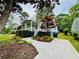 Charming home exterior with a well-manicured front yard and a paved walkway at 67 Lannon Ne Ave, Atlanta, GA 30317
