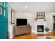 Bright living room with hardwood floors, a fireplace, and a neutral color palette at 67 Lannon Ne Ave, Atlanta, GA 30317