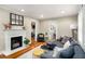 Cozy living room with a fireplace, hardwood floors, and stylish decor at 67 Lannon Ne Ave, Atlanta, GA 30317