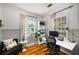 Comfortable office area with hardwood floors, large windows, and modern furnishings at 67 Lannon Ne Ave, Atlanta, GA 30317