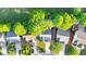 Aerial view of the property surrounded by lush trees at 335 Pintail Ct, Suwanee, GA 30024