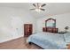 Bedroom featuring vaulted ceiling, dresser, and ample closet space at 335 Pintail Ct, Suwanee, GA 30024
