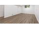 Large open basement featuring vinyl floors and windows allowing natural light at 535 Silver Pine Trl, Roswell, GA 30076